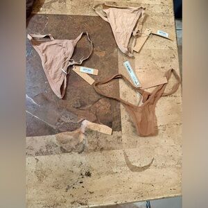 NWT SKIMS 3 piece string thong panties bundle.

LOT BIN 17